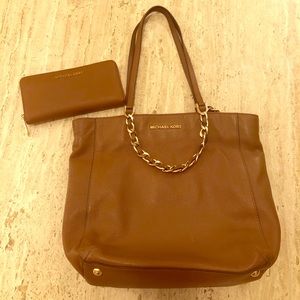 Michael Kors leather handbag and zip around wallet